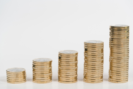 Columns of coins symbolizing the growth chartの写真素材