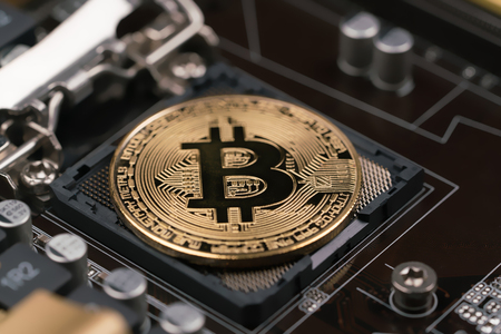 bitcoin lies on the processor socketの写真素材