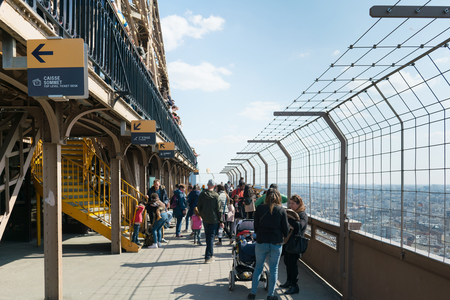 Paris, France - March 31, 2019: People visit Eiffel Tower observation deck.のeditorial素材