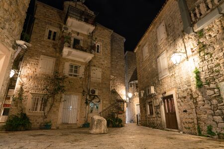 Budva, Montenegro - December 16, 2019: old town street at nightのeditorial素材