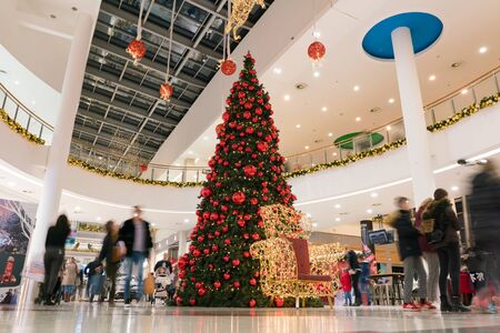 Podgorica, Montenegro - December 26, 2019: Interior of Delta City shopping center. Interior of a mall is festively decorated for the New Year holidays.のeditorial素材