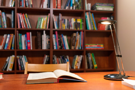 Open book on the table in libraryの写真素材