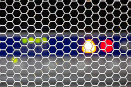 Server front side showing colorful switches and wiring Abstract blurred image for use as a...
