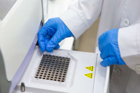 scientist working at the laboratory Close-up Limited depth of field