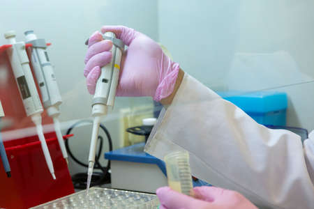 scientist working at the laboratory Close-up Limited depth of field
