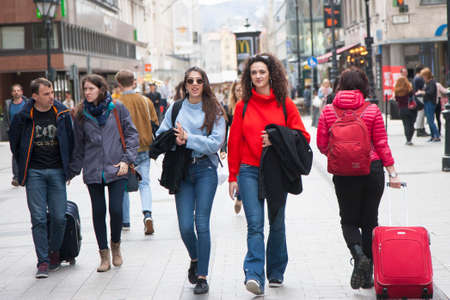 Budapest, Hungary - April 5, 2018: Two pretty girls walking down the street Genreのeditorial素材