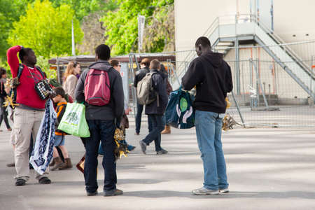 Paris, France - April 12, 2011 African immigrants sell souvenirs Genre