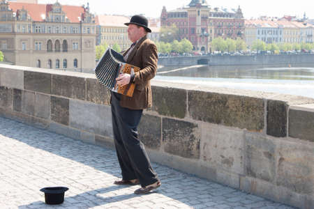 Prague, Czech Republic - April 20, 2011: Street musician in Karlov bridge Genreのeditorial素材