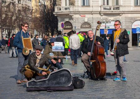 Prague, Czech Republic - March 13, 2017: Quartet of Musicians playing musical instruments for tourists on the street in Prague Portraitのeditorial素材