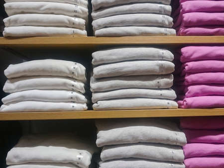 Men's multi-colored knitted shirts on store shelves Close-upの写真素材