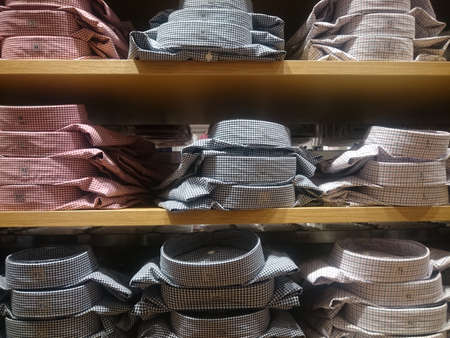 Classic multi-colored men's shirts on store shelves Color imageの写真素材