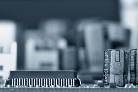 Electronic components are mounted on the device board Chips diodes capacitors chokes Toned image