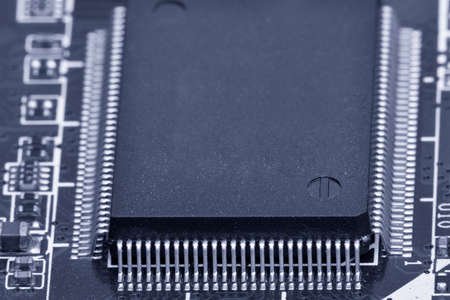 Electronic components are mounted on the device board Chips diodes capacitors chokes Toned image