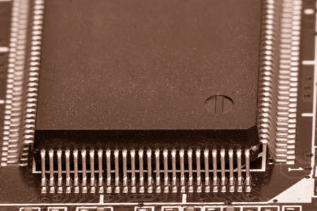 Electronic components are mounted on the device board Chips diodes capacitors chokes Toned image