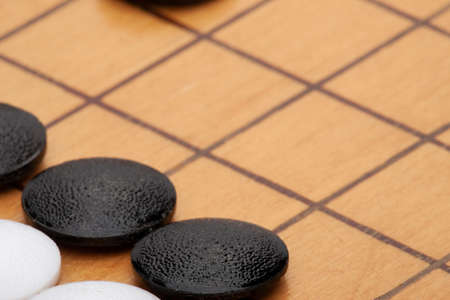Go board,traditional Chinese strategy board game.Game brain training Close-up