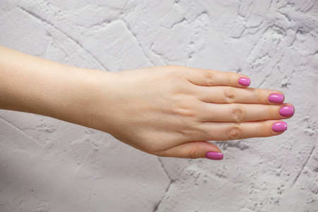 Beautiful Female Hands. Beautiful hand with perfect nails Soft focusの写真素材