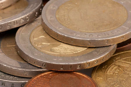Money coins background. Euro coins with patina. Selective focus Close-up