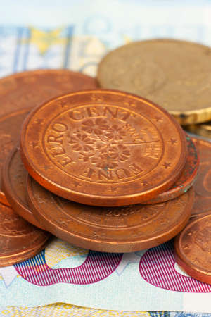 Micro loan offer. Little bit of European Union money. Metal coins of and paper banknotes design....
