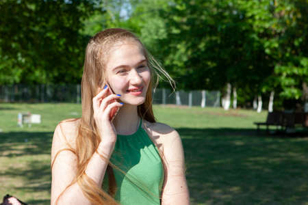 beautiful girl in the garden on a sunny day Portrait