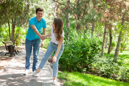 Happy couple having fun together outdoor. Happines, great relationship. Man and woman fooling around. Portraitの写真素材