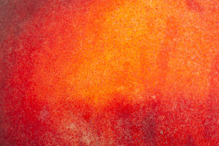 the skin of the peach as a background. close-upの写真素材