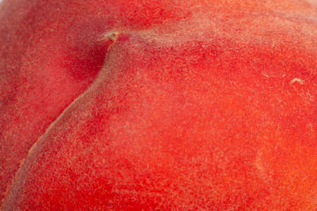 the skin of the peach as a background. close-upの写真素材