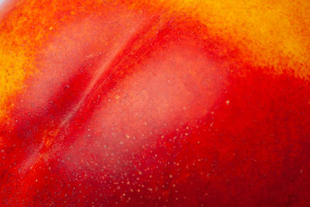 Close up nectarine skin. Fresh organic peaches. Fruit peaches background. Fruit background.の写真素材