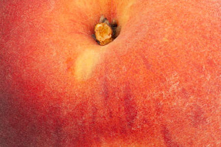 the skin of the peach as a background. close-upの写真素材