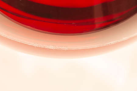 Glass of red wine with shadow.Top view . Close-upの写真素材