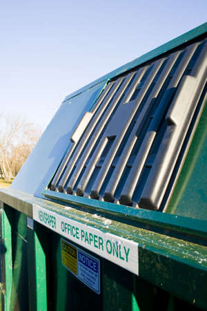 A newspaper and cardboard recycling dumpster.の写真素材