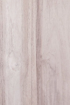 The teak wood surface is painted in light tones.の写真素材