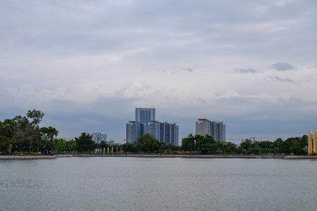 Landscape of the lake and skyscrapers in the city.の写真素材