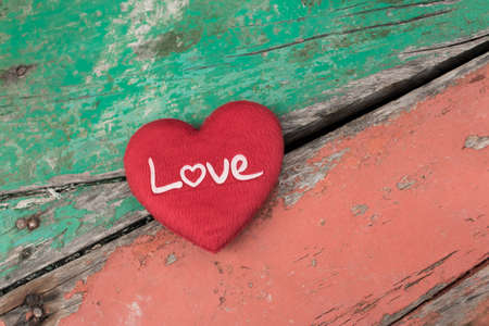 red heart on wooden background,happy valentine's day concept.i love you.の写真素材