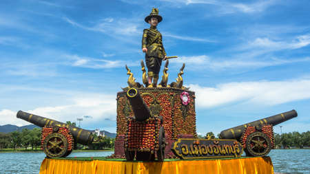 the king of thonburi statue with dummy canons made of rambutans on Durian wolrd fair, Chanthaburi,...