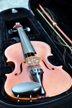 extremely old scratched violinの写真素材