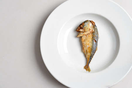 Fried Mackerel On The White Plate