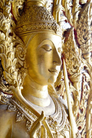 Thai molding art on the wall, U-thaithani province, Thailand.の写真素材