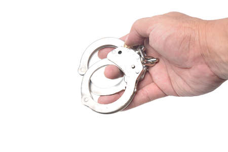 handcuffs isolated in whiteの写真素材