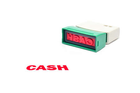 closeup of cash letter on rubber stamp isolated on white backgroundの写真素材