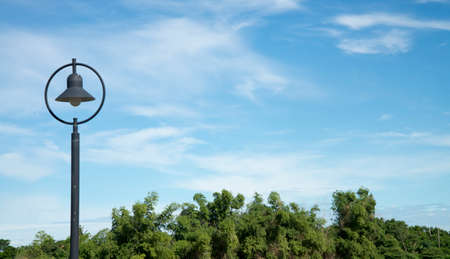 Lamp on a pole on sky backgroundの写真素材