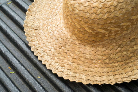 Straw hat or gardening hat.