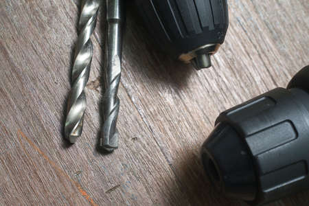 Cordless Power Drill on wooden table