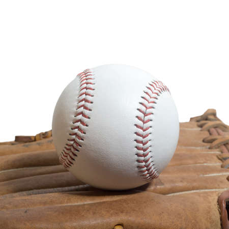 Old worn leather baseball glove and used ball on a white background