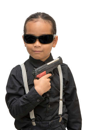 young asia boy with gun isolate on white background.の写真素材
