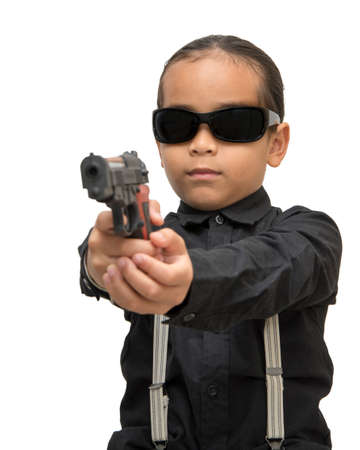 young asia boy with gun isolate on white background.の写真素材
