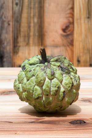 Custard apple on wood background , sweetsopの写真素材