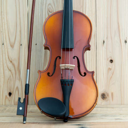 still life with vintage violin rustic wooden background