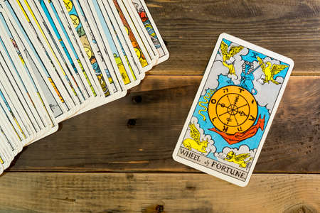 WHEEL of FORTUNE tarot cards on the table.