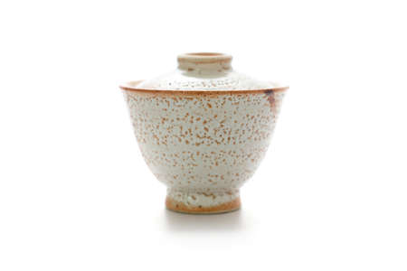 Antique tea cup isolated on white backgroundの写真素材