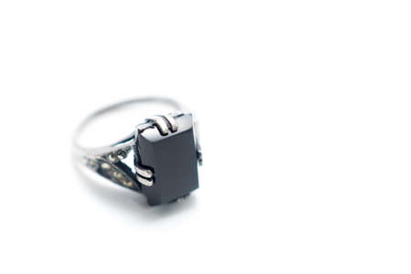 Silver rings with black onyx isolated on white background.の写真素材